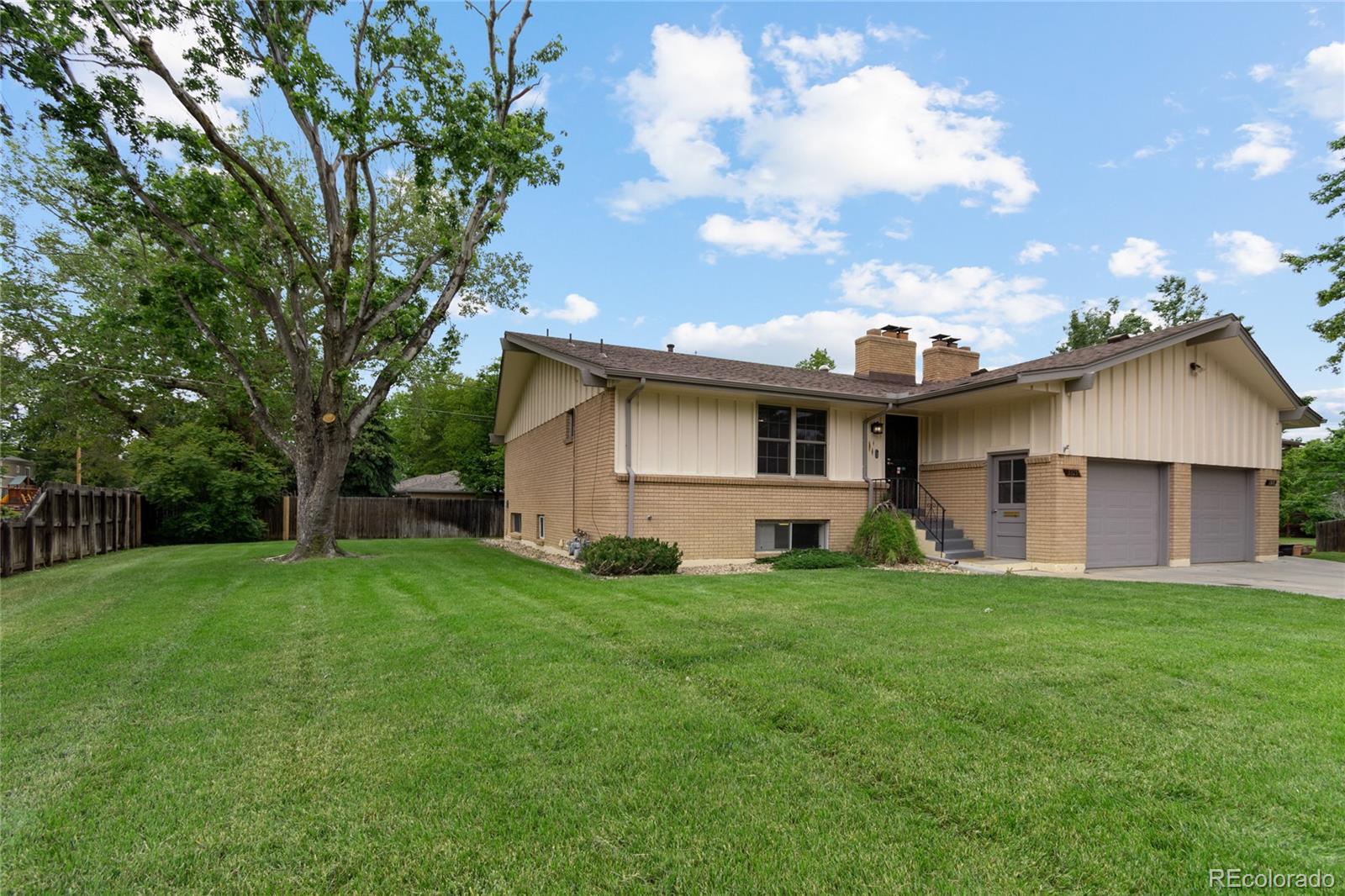 3315 Marshall Street Wheat Ridge, CO 80033 - Photo 2 of 30 a view of a house with a yard