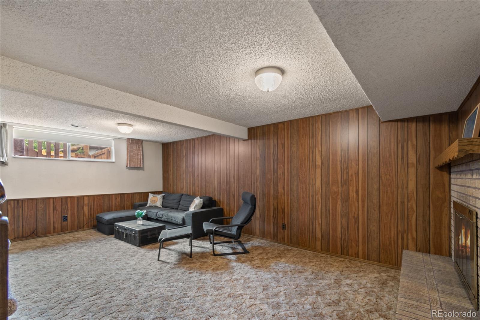 3315 Marshall Street Wheat Ridge, CO 80033 - Photo 23 of 30 a view of a livingroom with furniture and a window