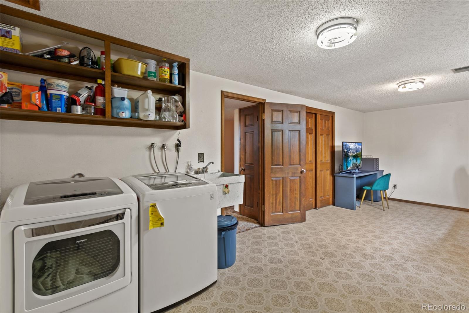 3315 Marshall Street Wheat Ridge, CO 80033 - Photo 26 of 30 a room with storage and utility