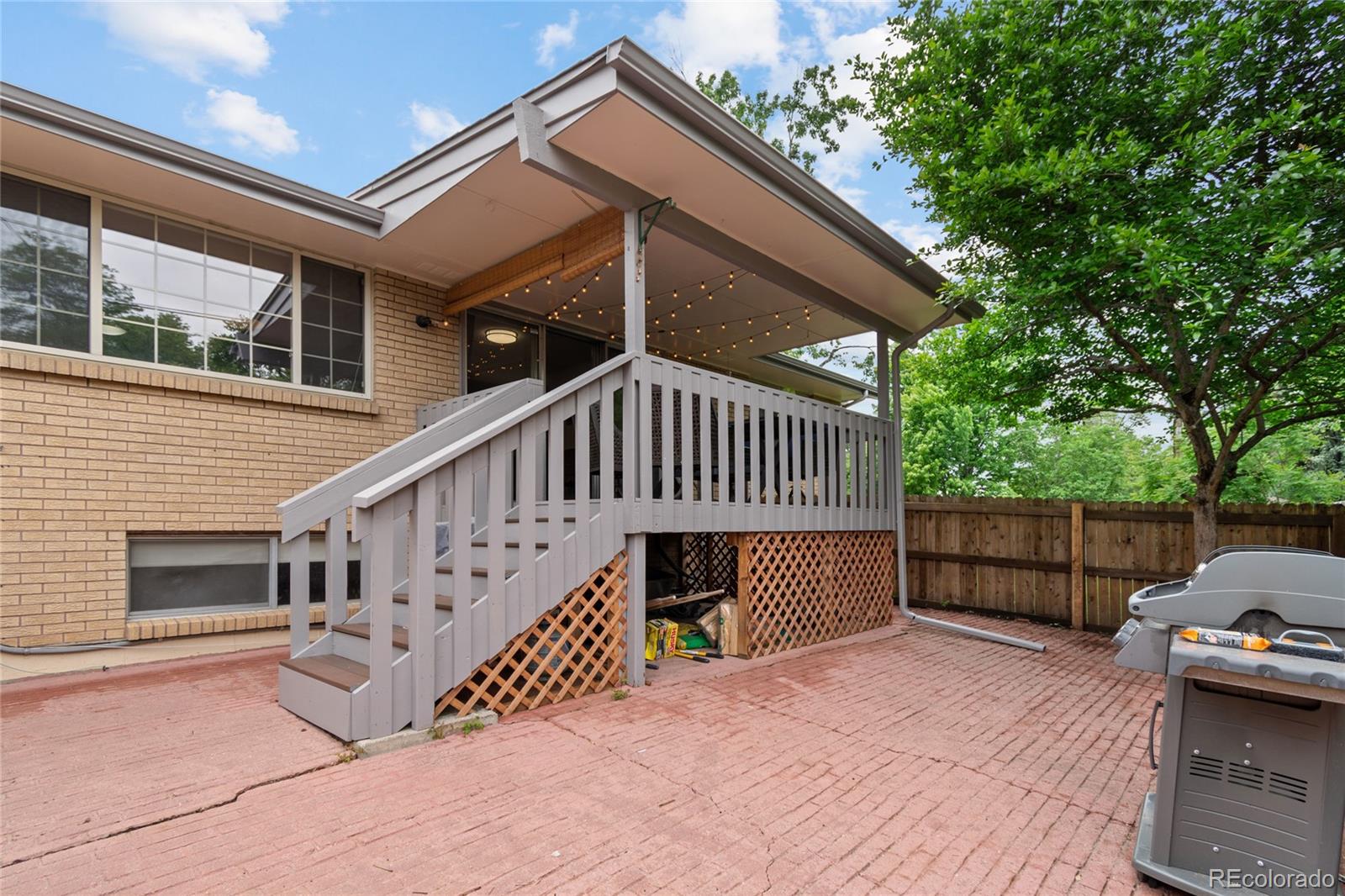 3315 Marshall Street Wheat Ridge, CO 80033 - Photo 30 of 30 a view of house with a deck and furniture