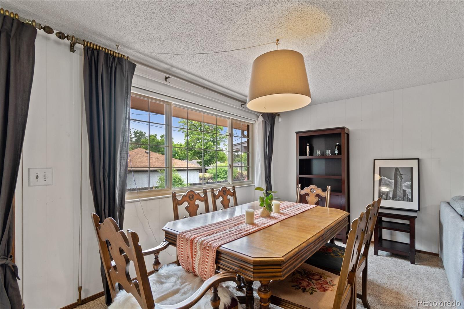 3315 Marshall Street Wheat Ridge, CO 80033 - Photo 9 of 30 a view of a dining room with furniture window and outside view