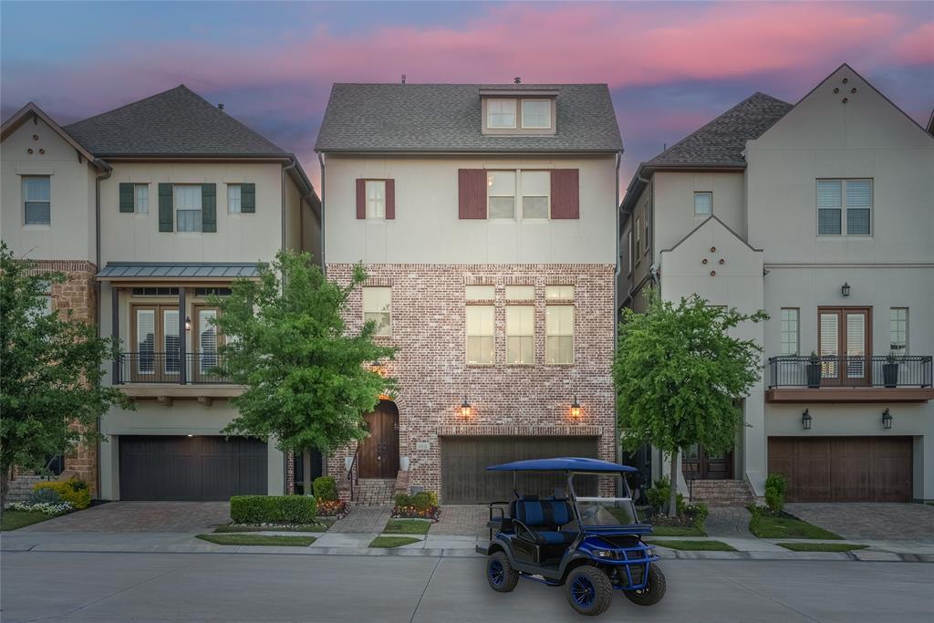 a car parked in front of a white building
