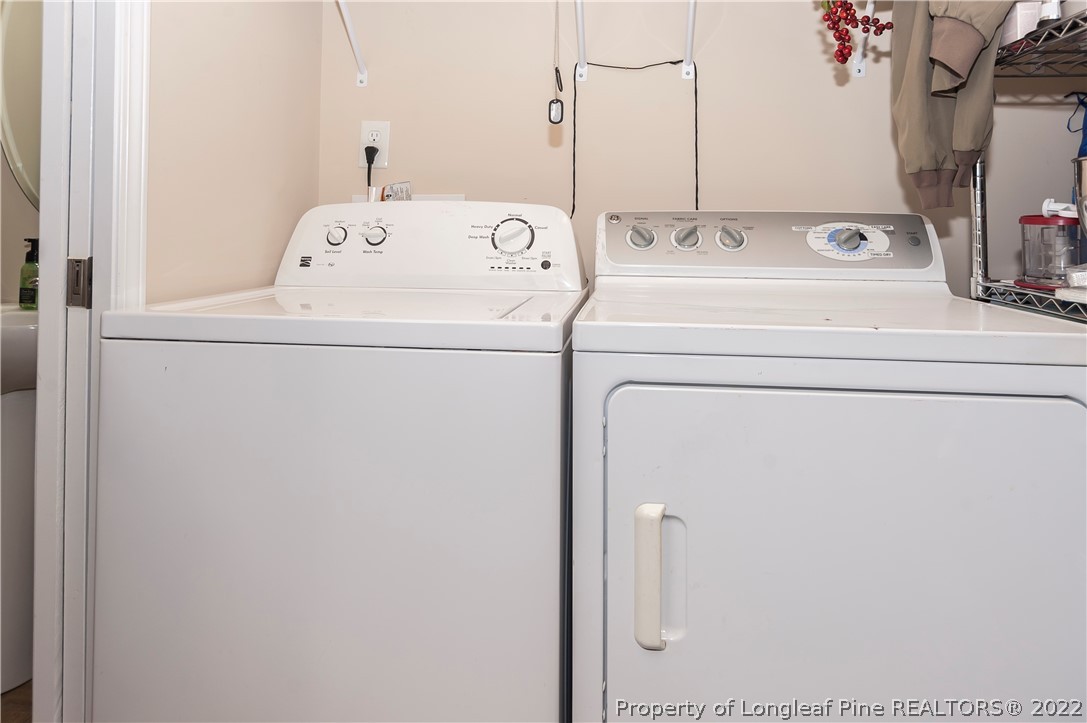 4980 Aberdeen Road Raeford, NC 28376 - Photo 17 of 38 a utility room with dryer and washer