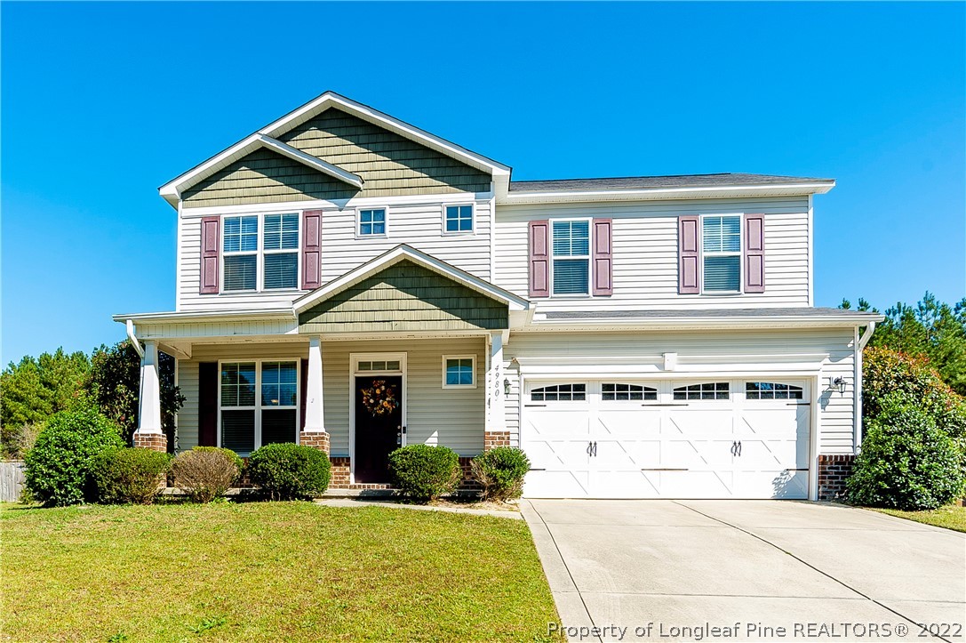 4980 Aberdeen Road Raeford, NC 28376 - Photo 2 of 38 front view of a house with a yard