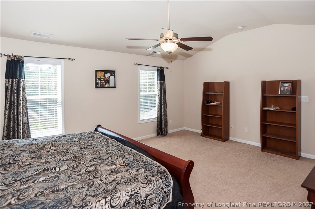 4980 Aberdeen Road Raeford, NC 28376 - Photo 21 of 38 a bedroom with a bed and a window