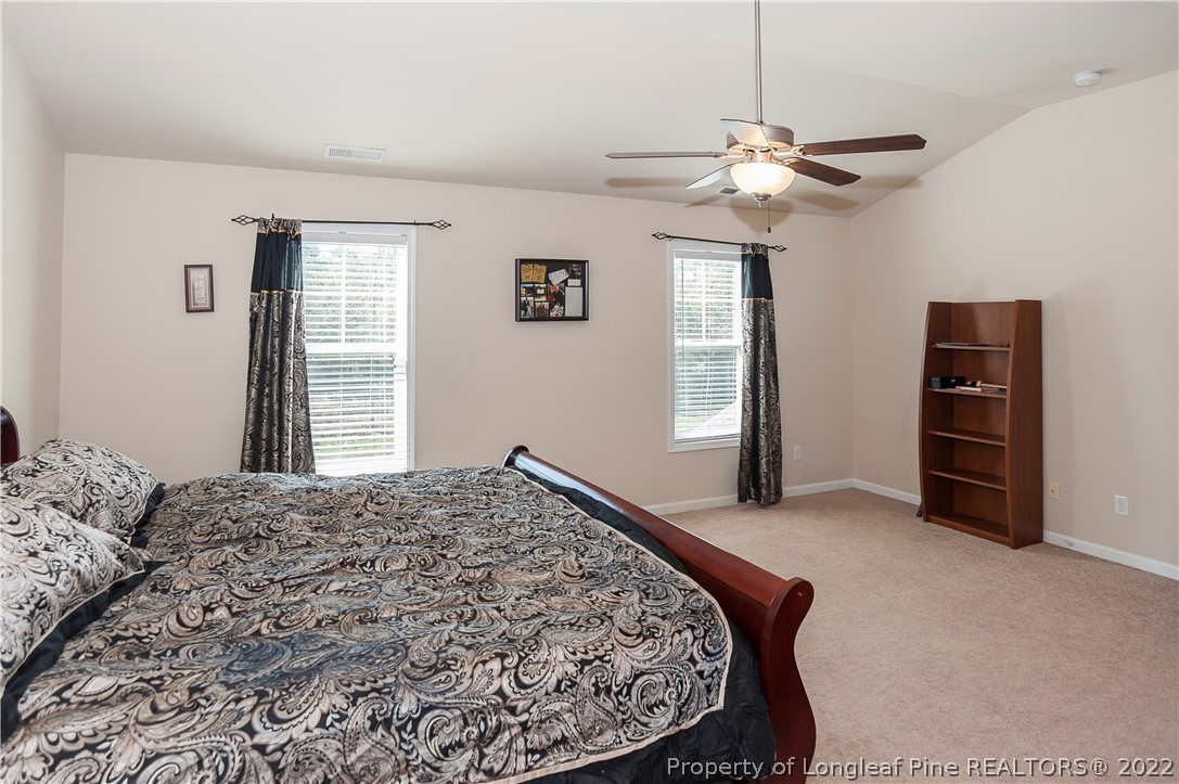 4980 Aberdeen Road Raeford, NC 28376 - Photo 22 of 38 a bedroom with a bed and a window