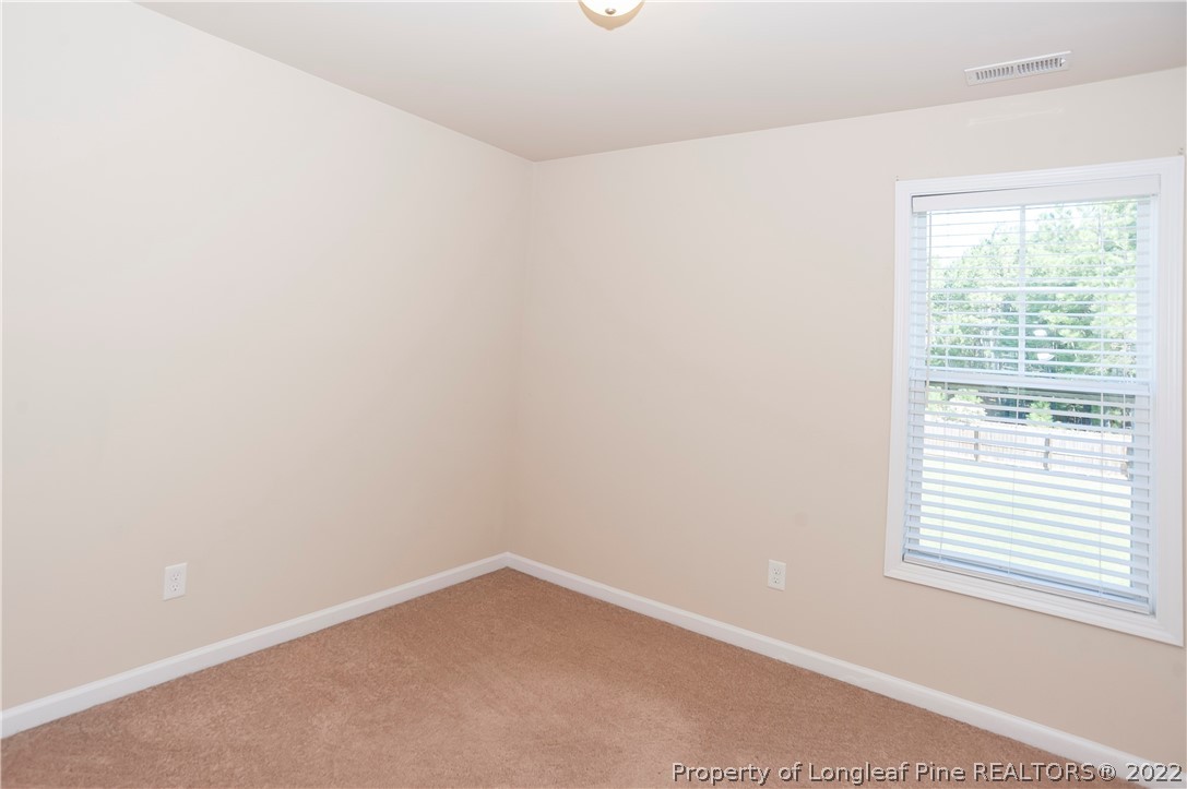 4980 Aberdeen Road Raeford, NC 28376 - Photo 25 of 38 a room that has a window in it