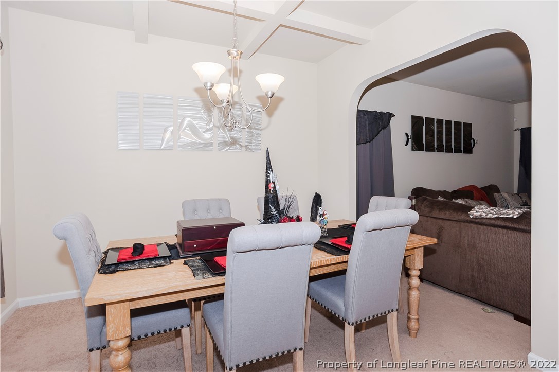 4980 Aberdeen Road Raeford, NC 28376 - Photo 6 of 38 a dining room with furniture and chandelier