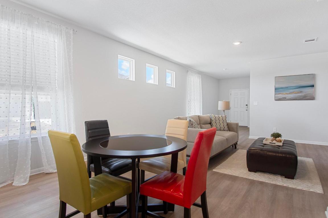 149 Cutleaf, Unit 31 San Marcos, TX 78666 - Photo 4 of 11 a view of a dining room with furniture and window