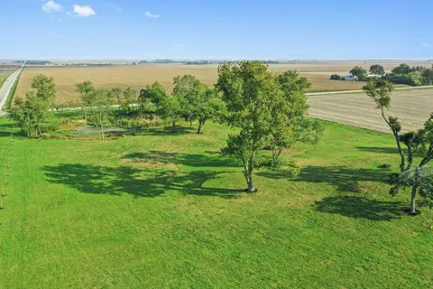 a house view with a garden space