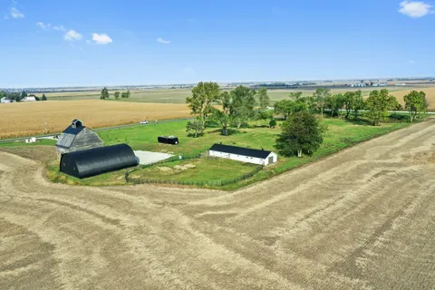 a view of a lake with a yard
