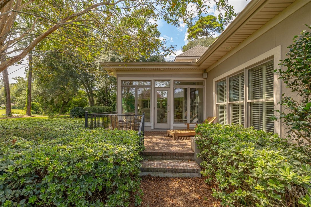 112 Cascades St. Simons Island, GA 31522 - Photo 51 of 66 Side yard and patio