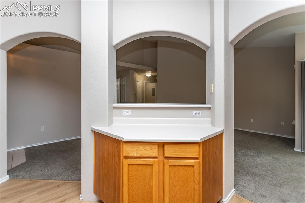 3815 Riviera Grove, Unit 201 Colorado Springs, CO 80922 - Photo 6 of 31 a bathroom with a sink and a mirror
