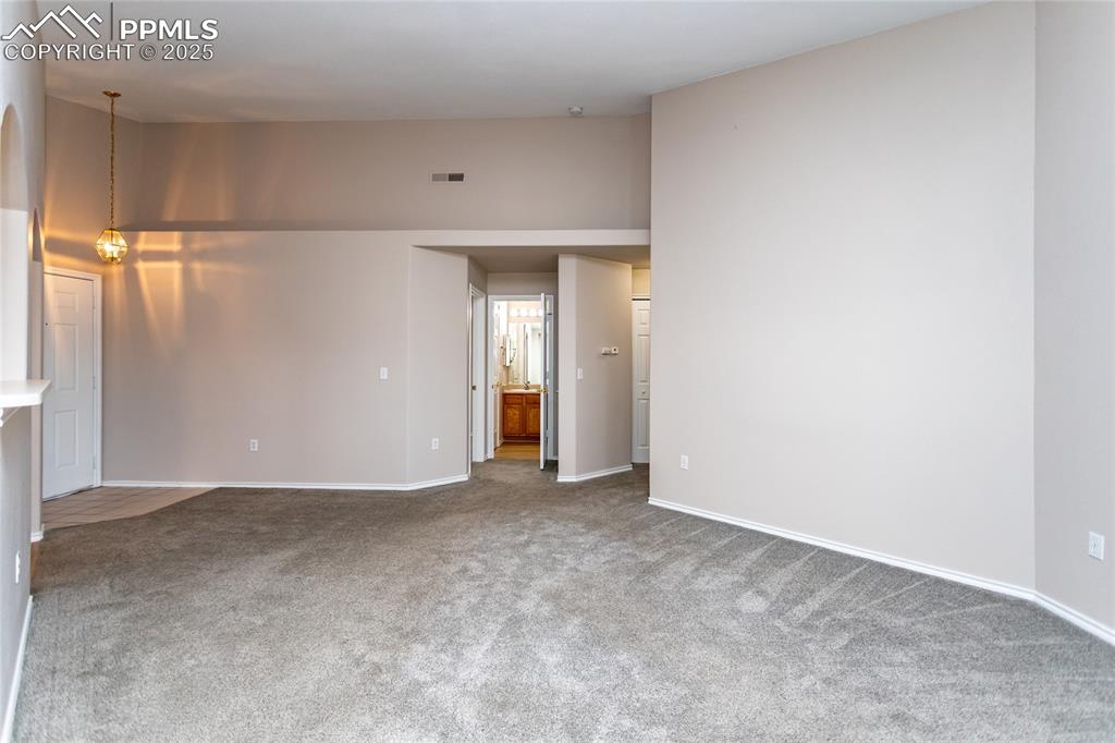 3815 Riviera Grove, Unit 201 Colorado Springs, CO 80922 - Photo 10 of 31 a view of an empty room with a window