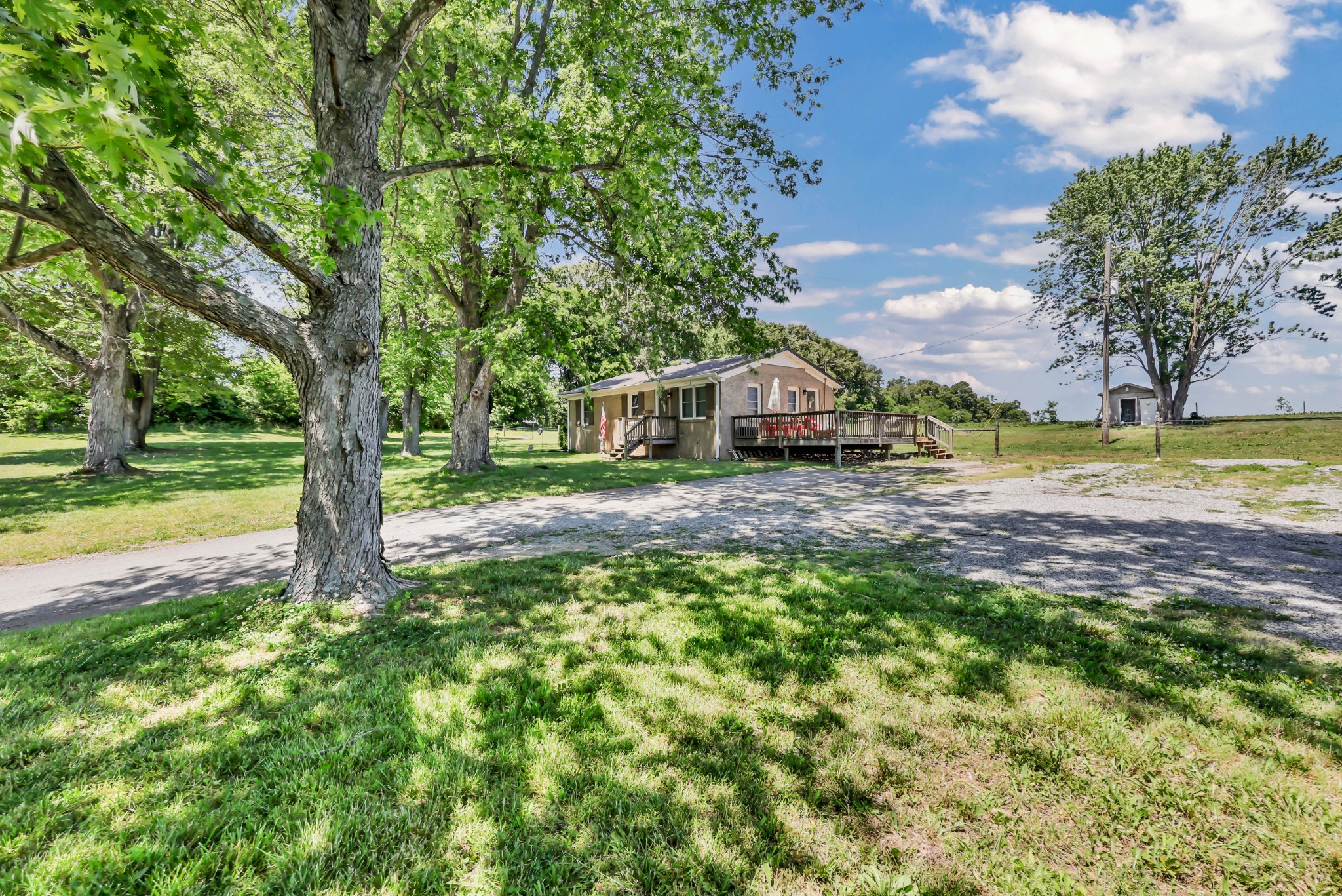 1068 Hugh Hunter Road Oak Grove, KY 42262 - Photo 1 of 30 a view of a house with a big yard