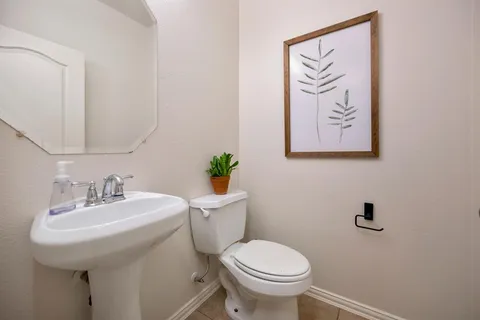 a bathroom with a sink and a toilet