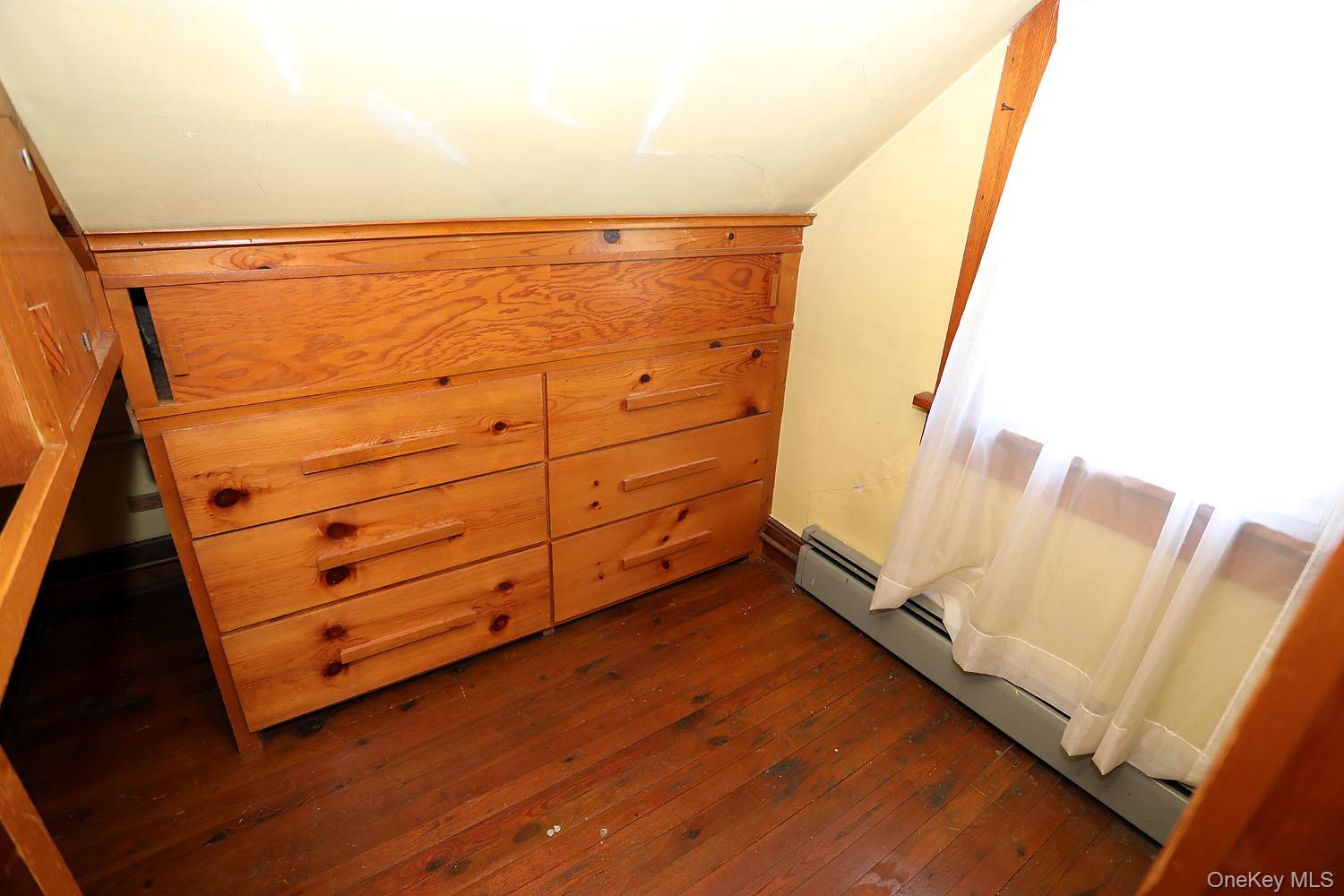 1779 Shandelee Road Livingston Manor, NY 12758 - Photo 17 of 31 a view of a room with wooden floor