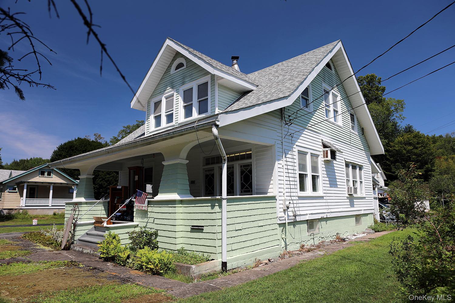 1779 Shandelee Road Livingston Manor, NY 12758 - Photo 30 of 31 a front view of a house with a yard