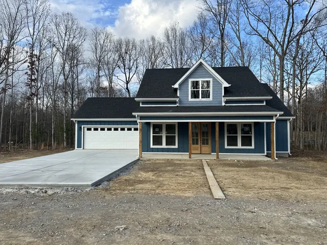 a house with trees in the background