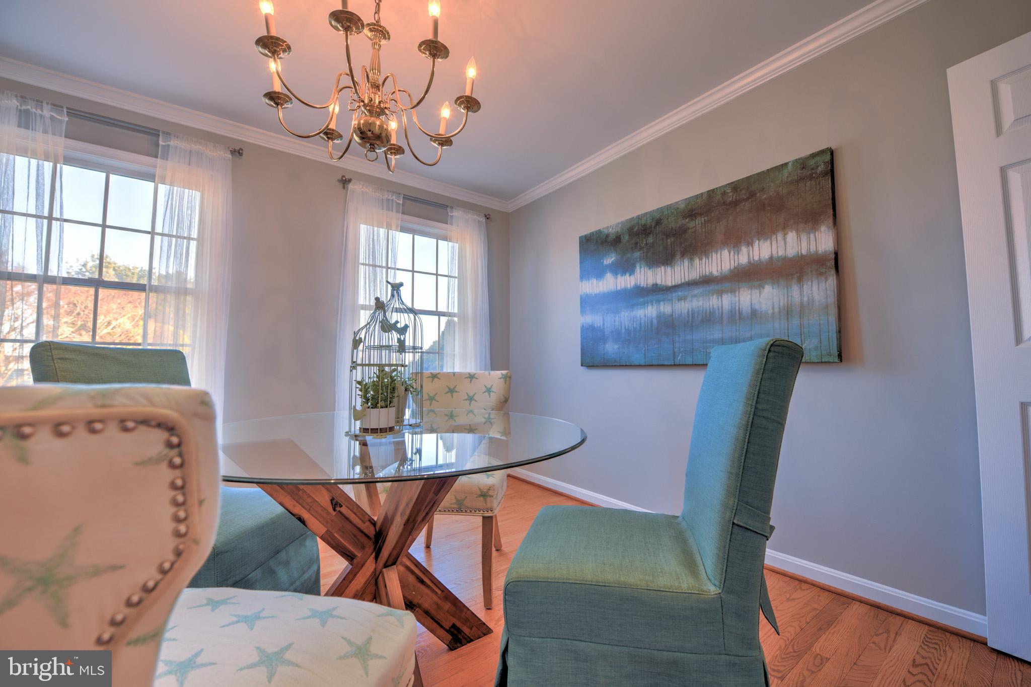 11489 Reed Circle Ridgely, MD 21660 - Photo 12 of 46 a view of a dining room with furniture and window