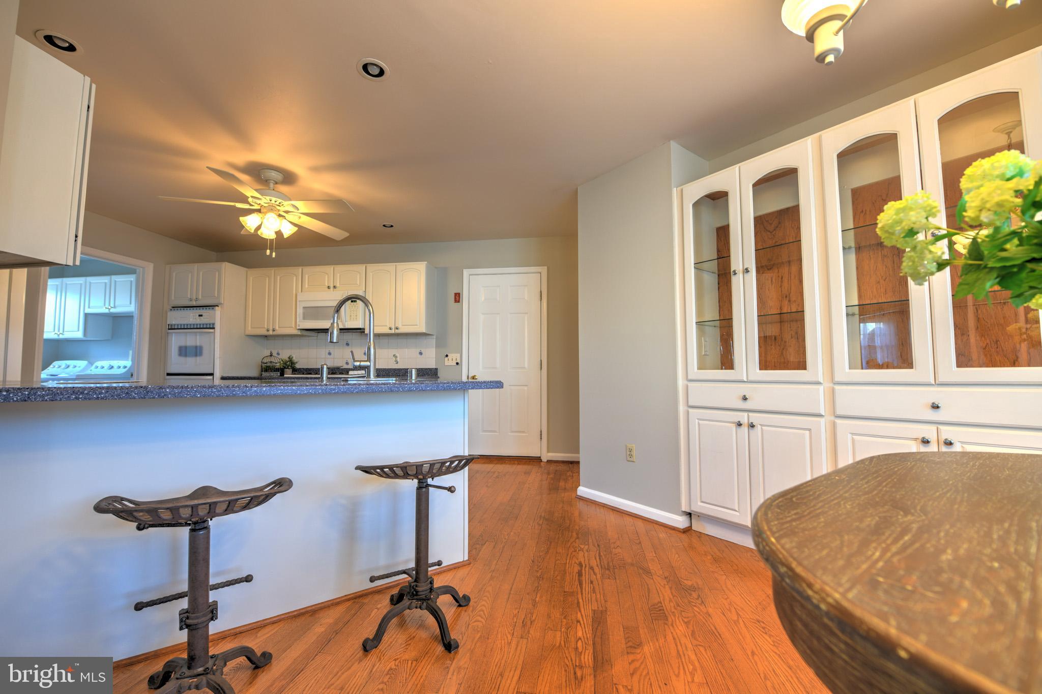 11489 Reed Circle Ridgely, MD 21660 - Photo 21 of 46 a bedroom with furniture and a chandelier