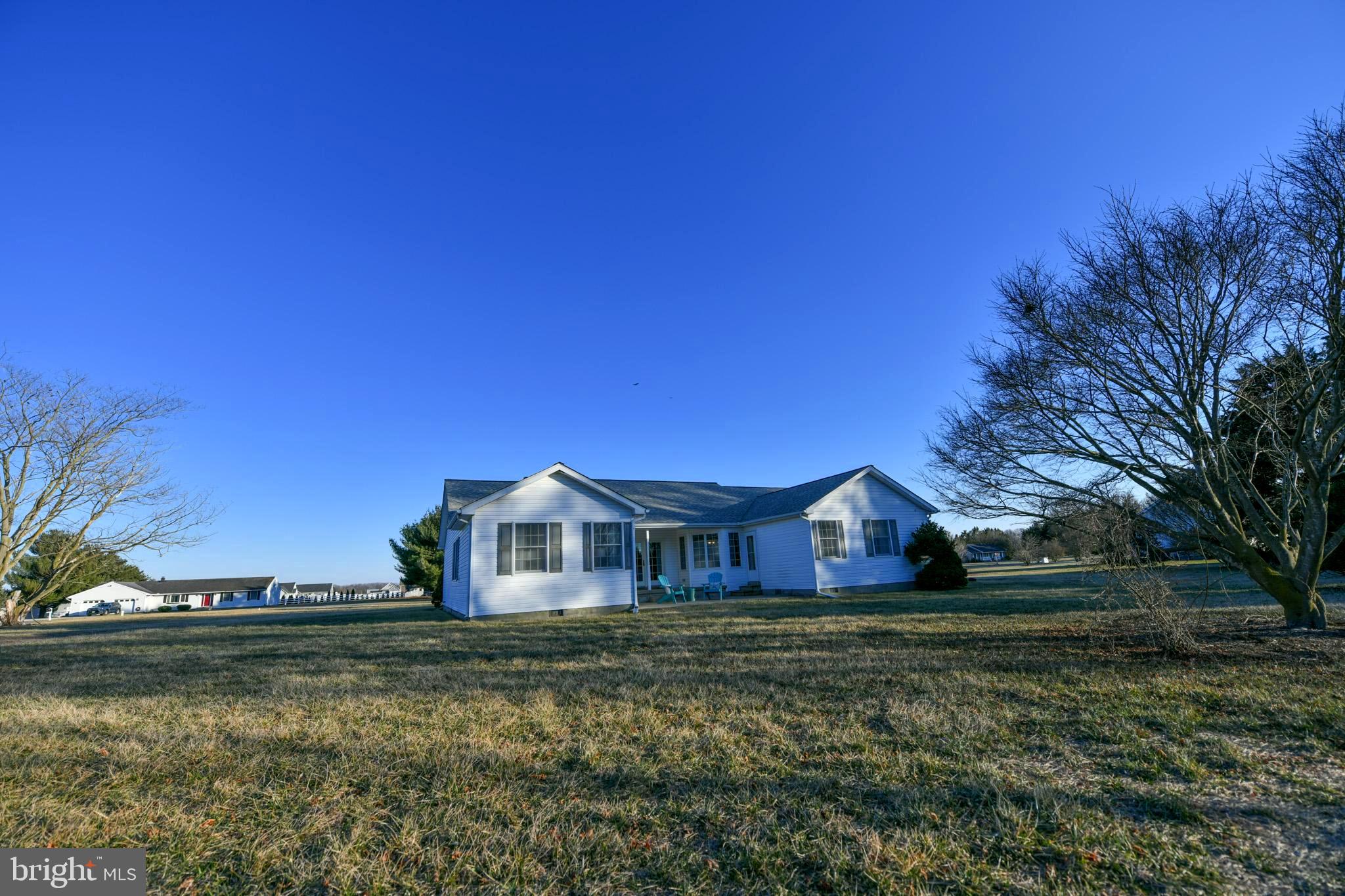11489 Reed Circle Ridgely, MD 21660 - Photo 46 of 46 a front view of a house with a yard