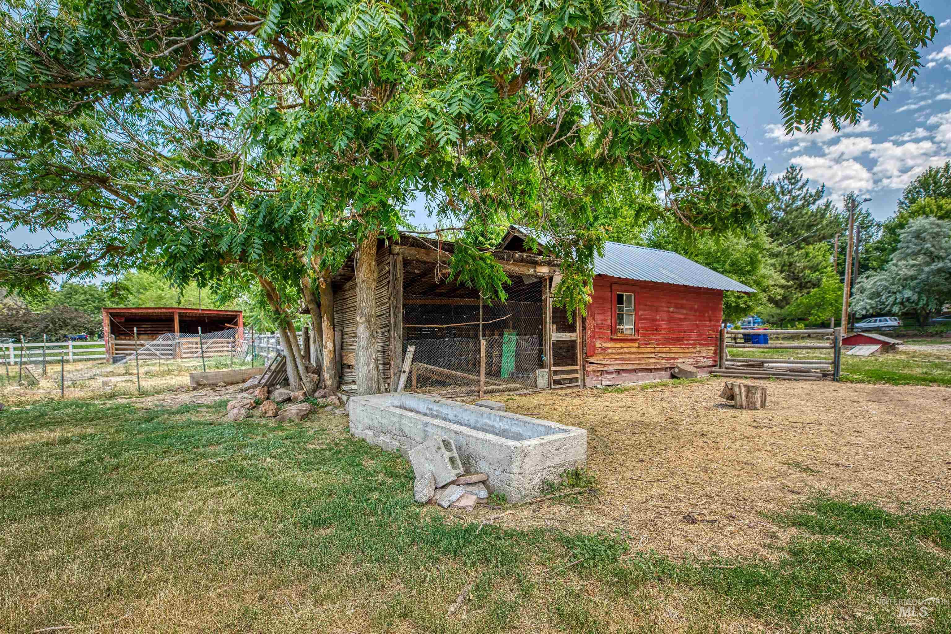 1119 North Eagle Road Eagle, ID 83616 - Photo 24 of 26 View of yard with an outdoor structure and an exterior structure
