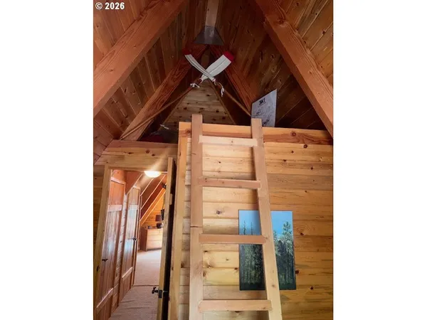 a view of backyard with outdoor seating