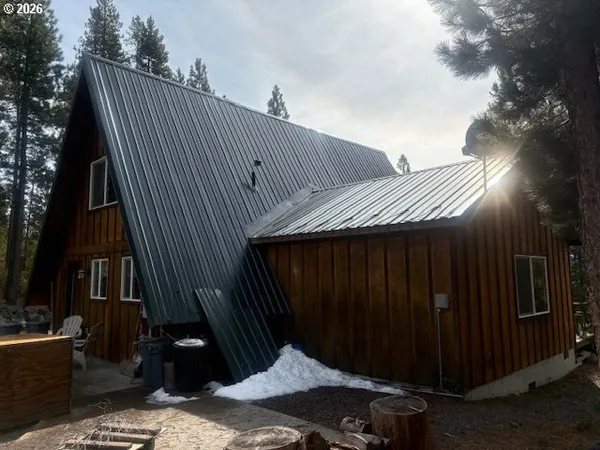 a kitchen with a sink and a refrigerator