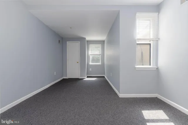 a view of an empty room with window