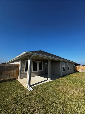 a front view of a house with garage