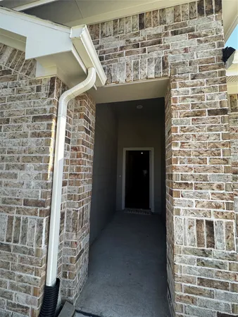 a view of a fireplace with an empty room
