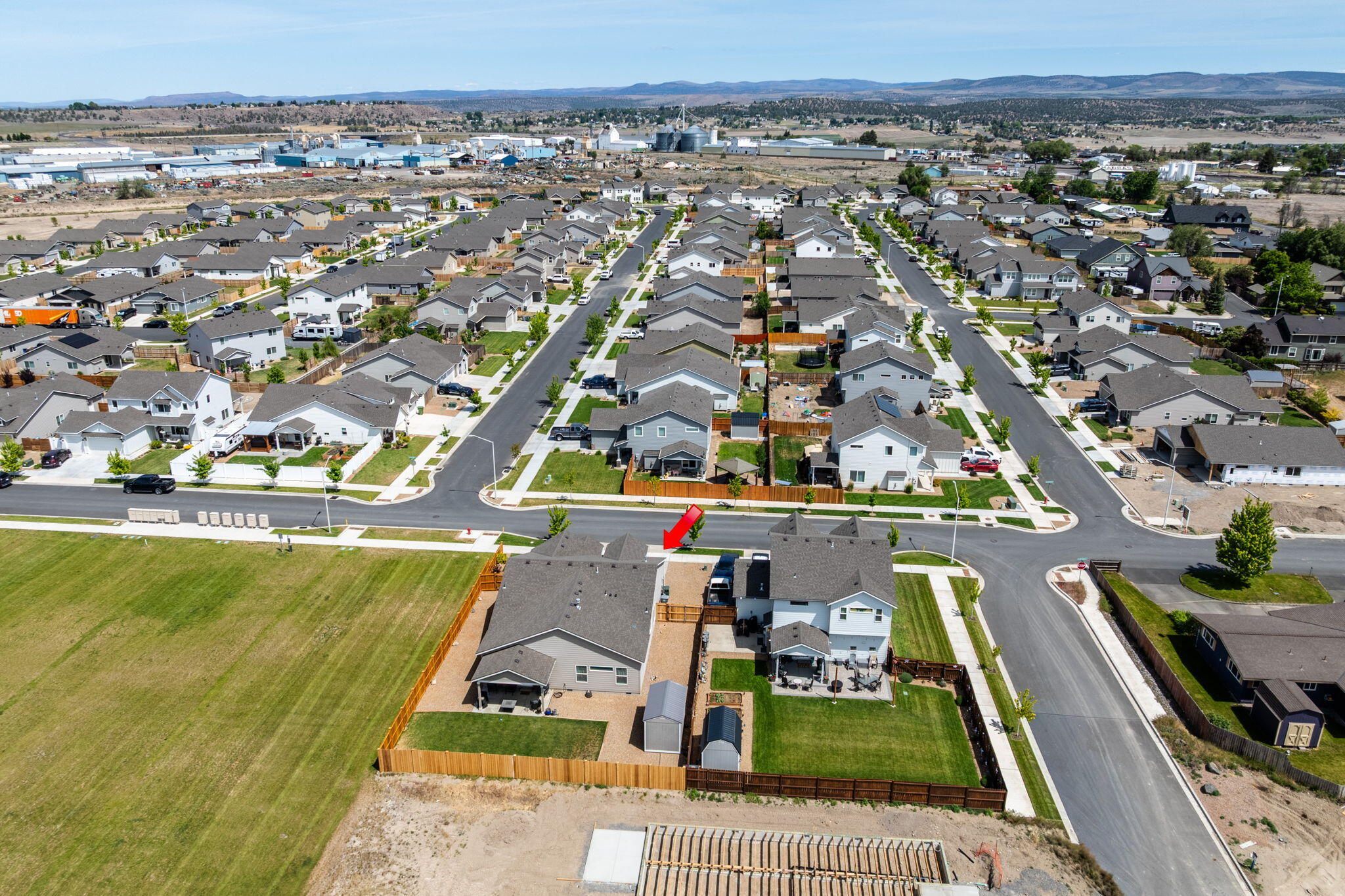 1132 Northwest Golf Course Drive Madras, OR 97741 - Photo 33 of 36 an aerial view of residential houses with outdoor space