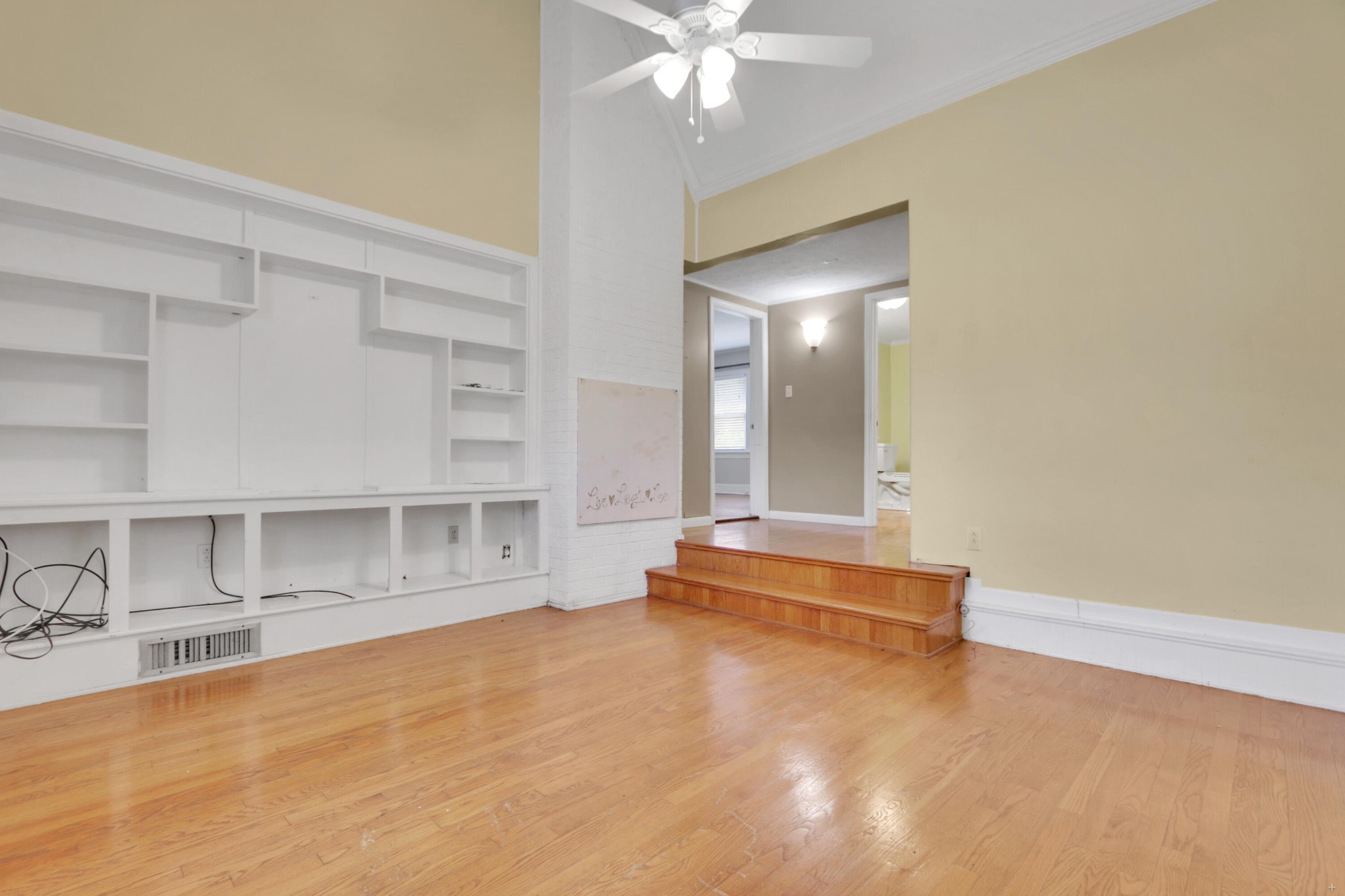 840 Batley Road Clinton, TN 37716 - Photo 13 of 30 a view of a livingroom with a large window and chandelier