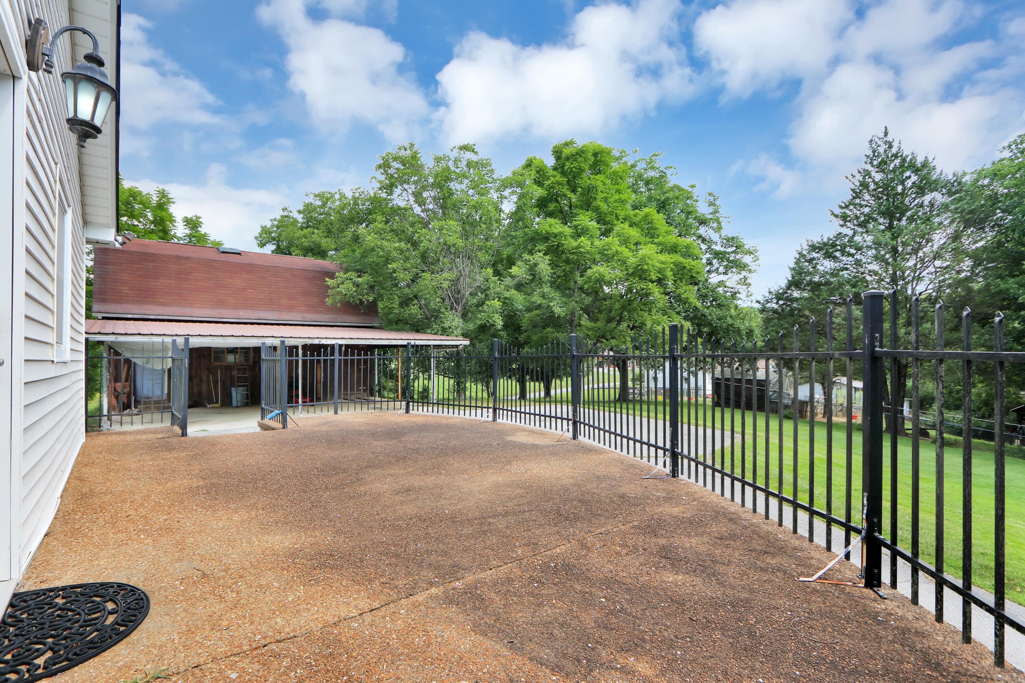 840 Batley Road Clinton, TN 37716 - Photo 25 of 30 a view of a backyard with a garden