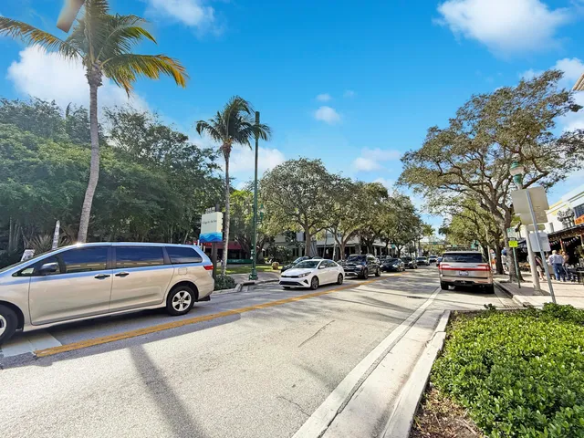 a view of a cars parked in front of a house