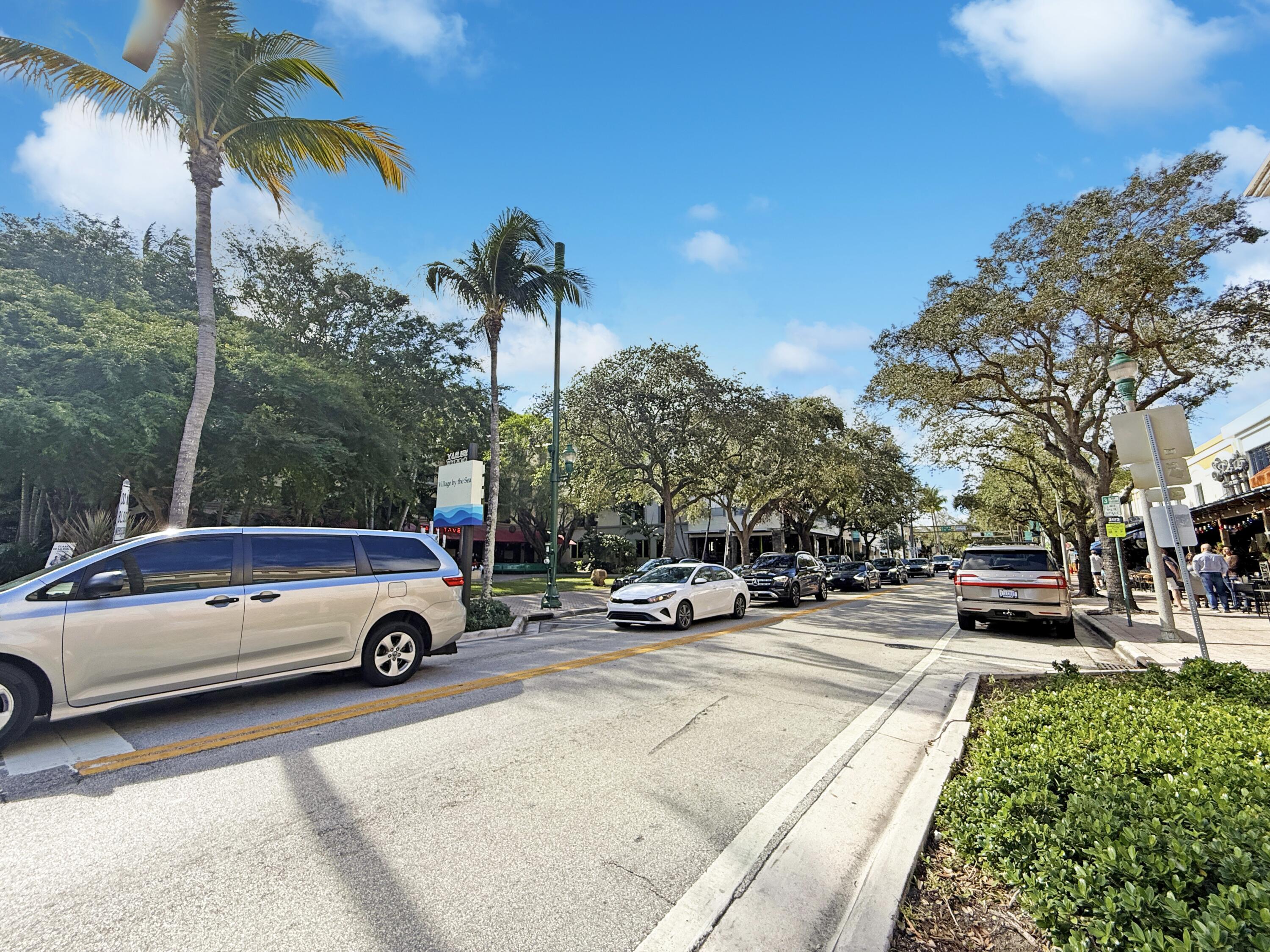 200 Northeast 2nd Avenue, Unit 414 Delray Beach, FL 33444 - Photo 15 of 16 a view of a cars parked in front of a house