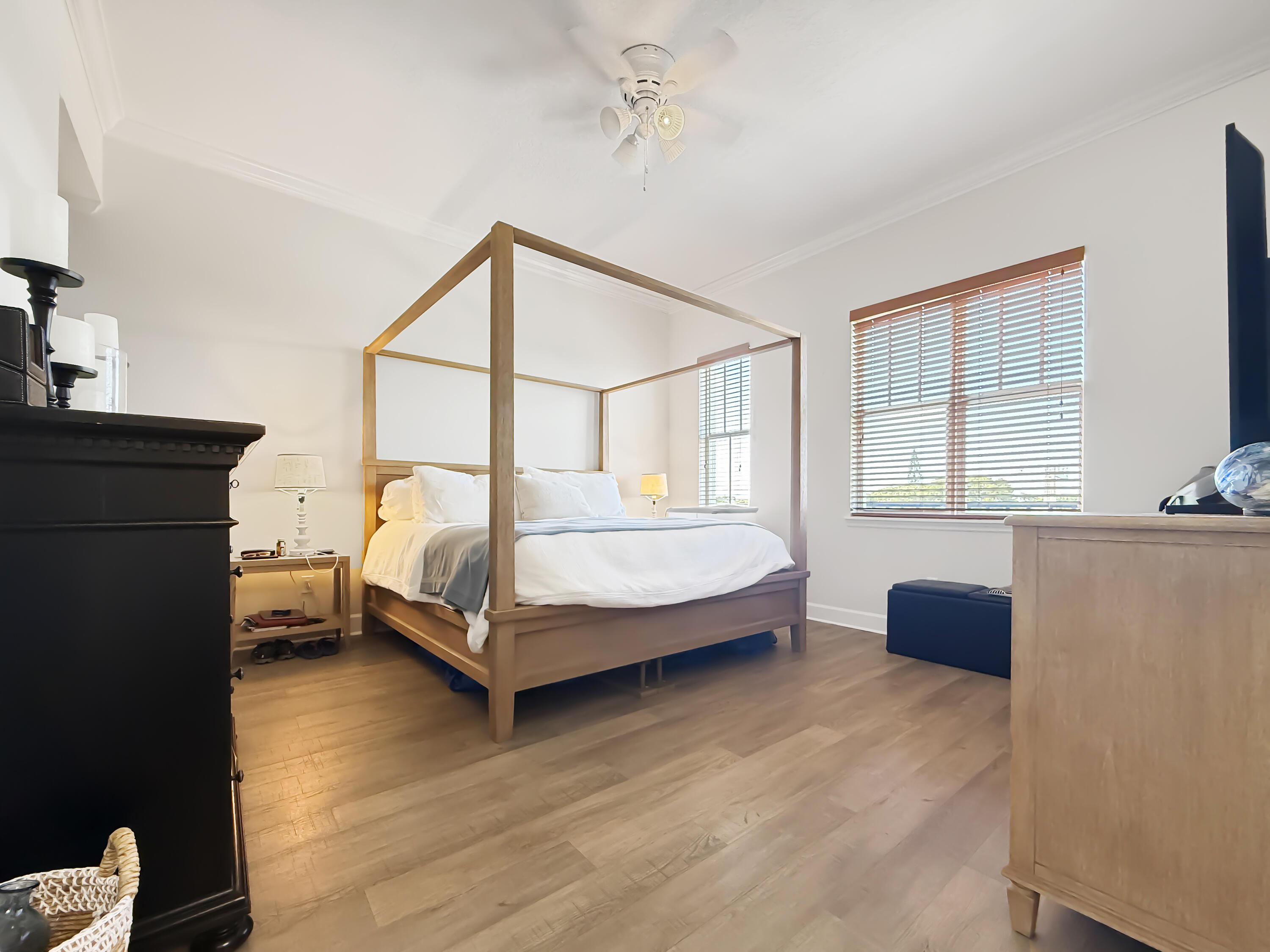 200 Northeast 2nd Avenue, Unit 414 Delray Beach, FL 33444 - Photo 5 of 16 a bedroom with a bed couch and a window