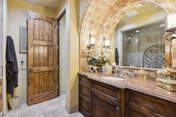 a building outdoor space with patio furniture and potted plants