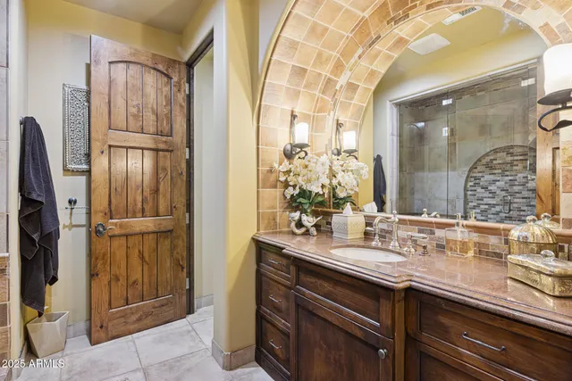 a building outdoor space with patio furniture and potted plants