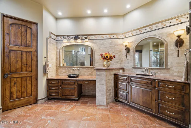 a view of a house with backyard porch and sitting area