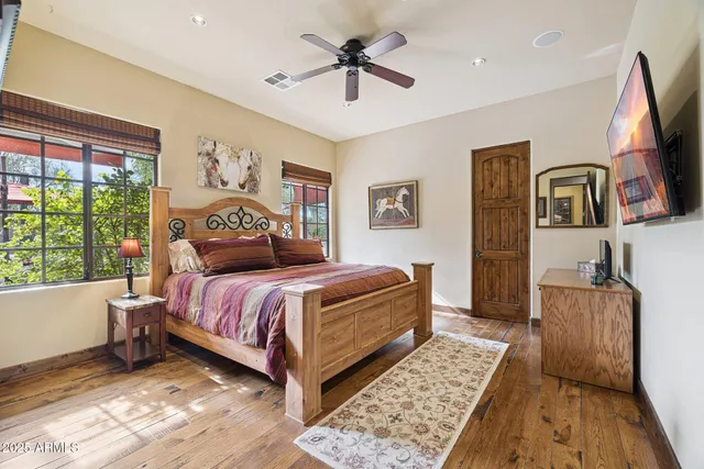 a room with gym equipment and windows