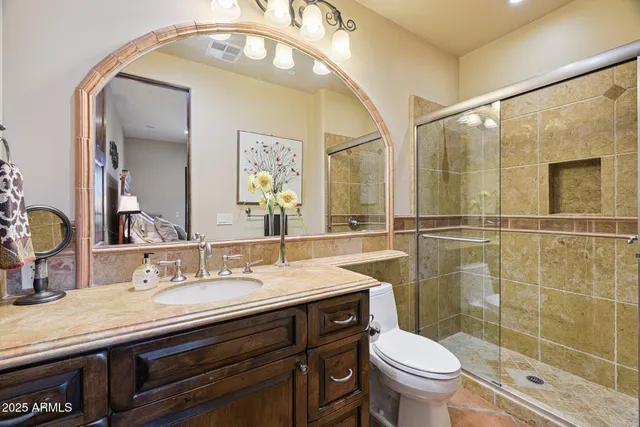 a view of a dining hall with stainless steel appliances kitchen island granite countertop a table and chairs