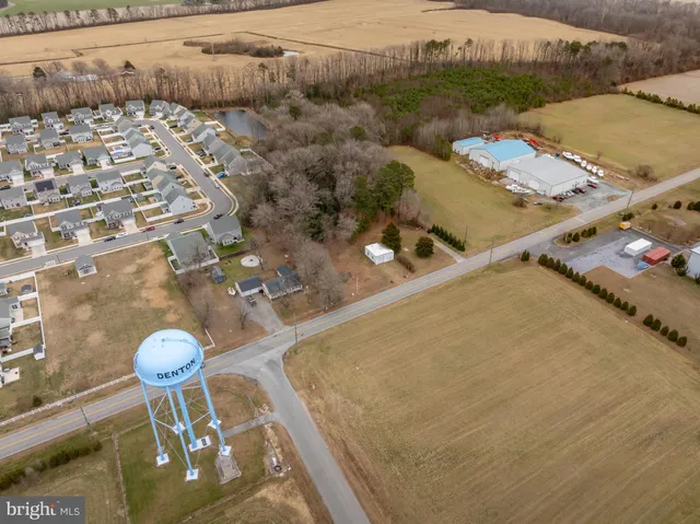 an aerial view of residential house with outdoor space