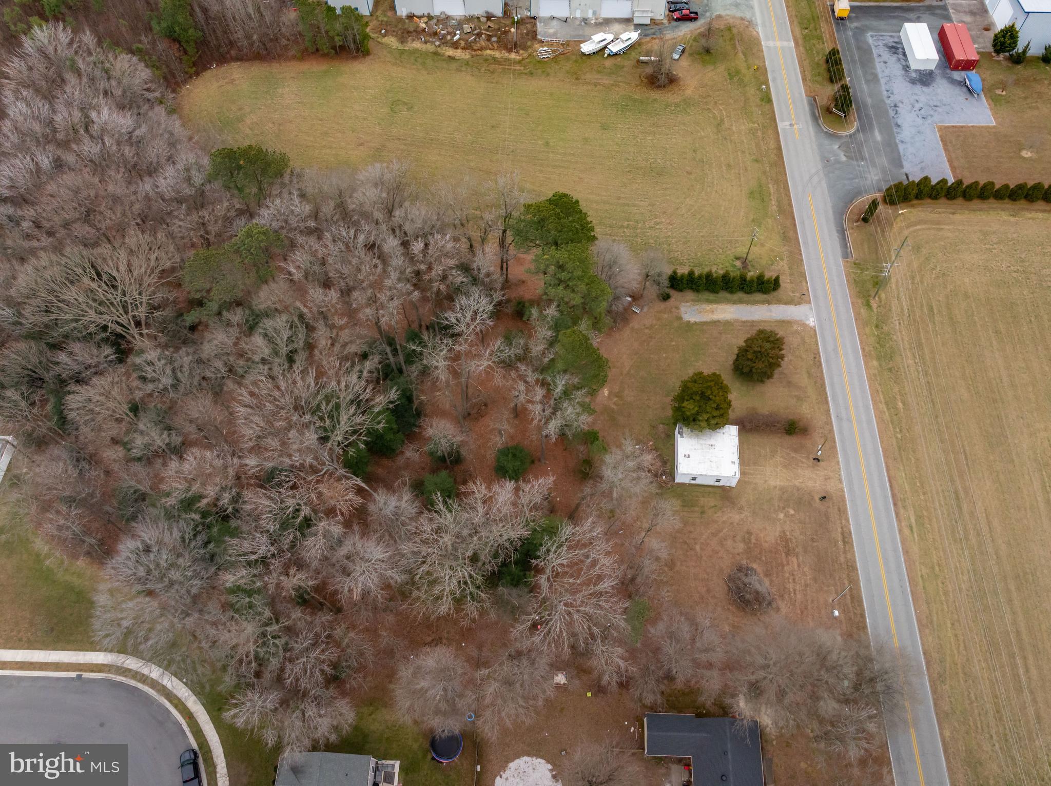 9571 Legion Road Denton, MD 21629 - Photo 14 of 26 an aerial view of a house with a yard