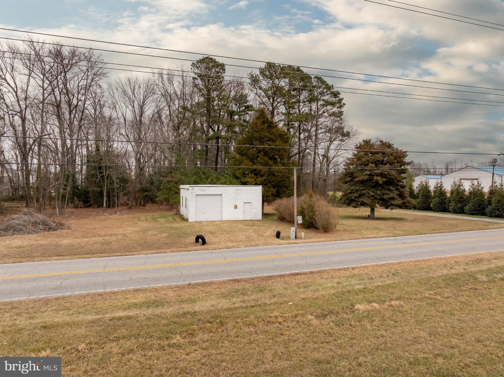 9571 Legion Road Denton, MD 21629 - Photo 21 of 26 a view of a house with snow on the road