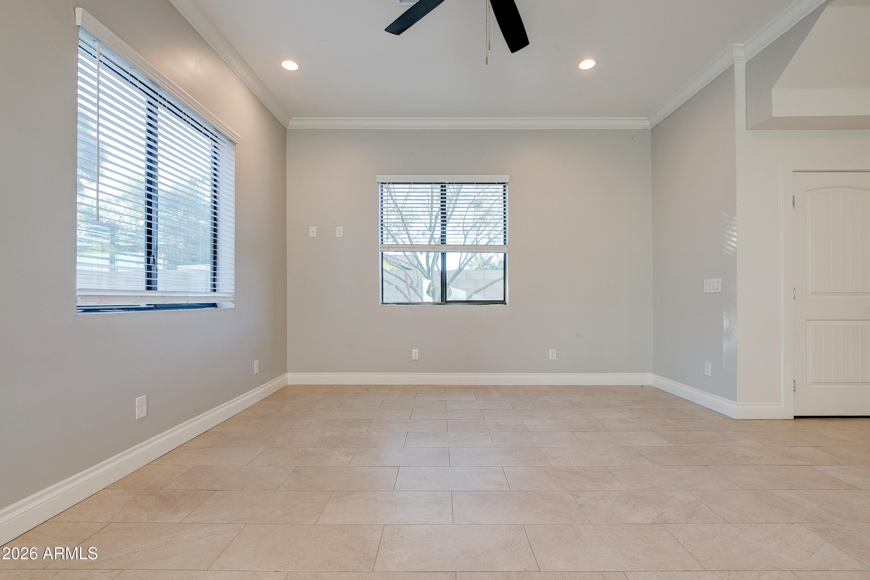 16075 North 30th Street Phoenix, AZ 85032 - Photo 14 of 41 an empty room with windows and closet