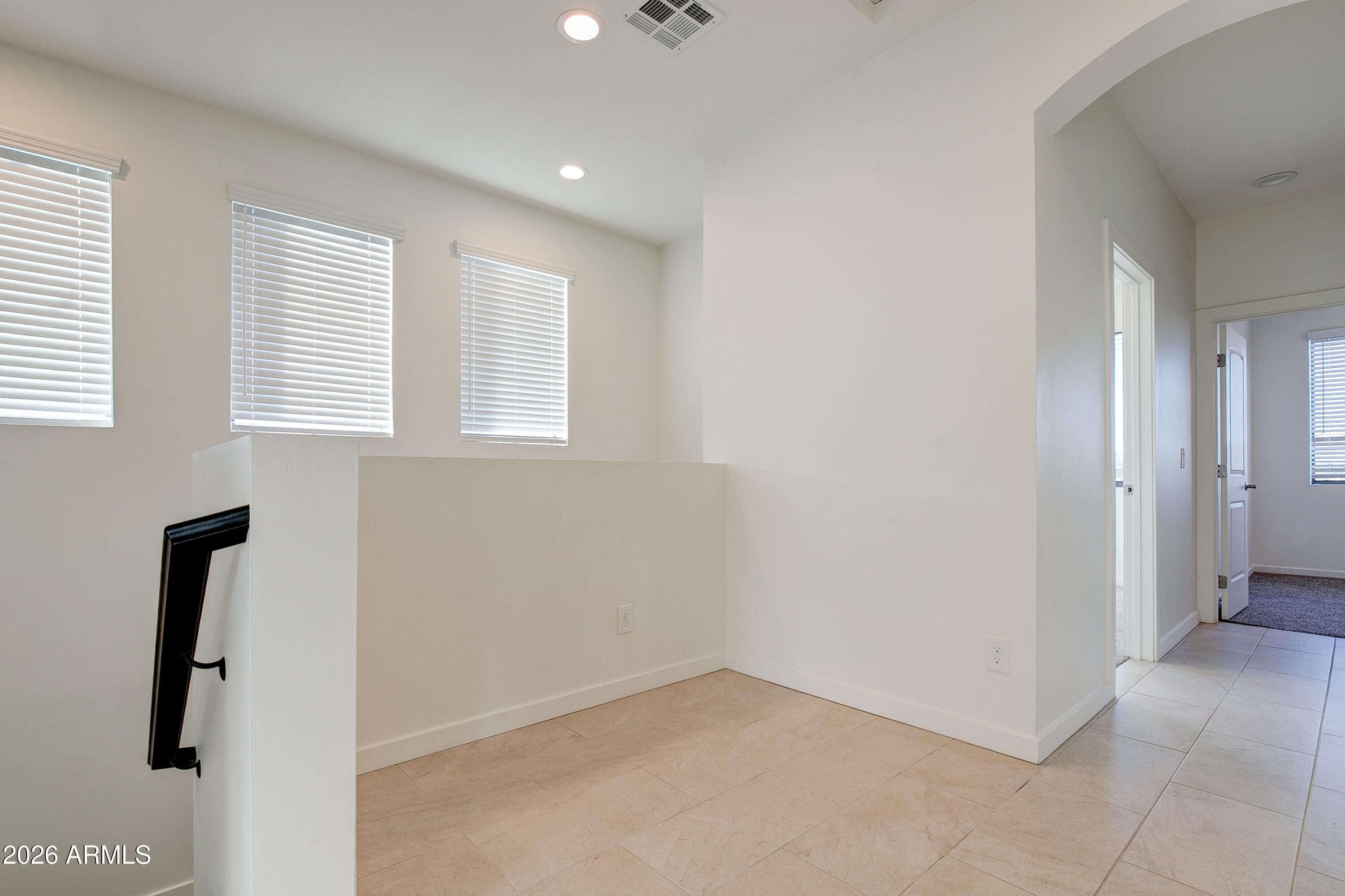 16075 North 30th Street Phoenix, AZ 85032 - Photo 16 of 41 an empty room with windows and closet