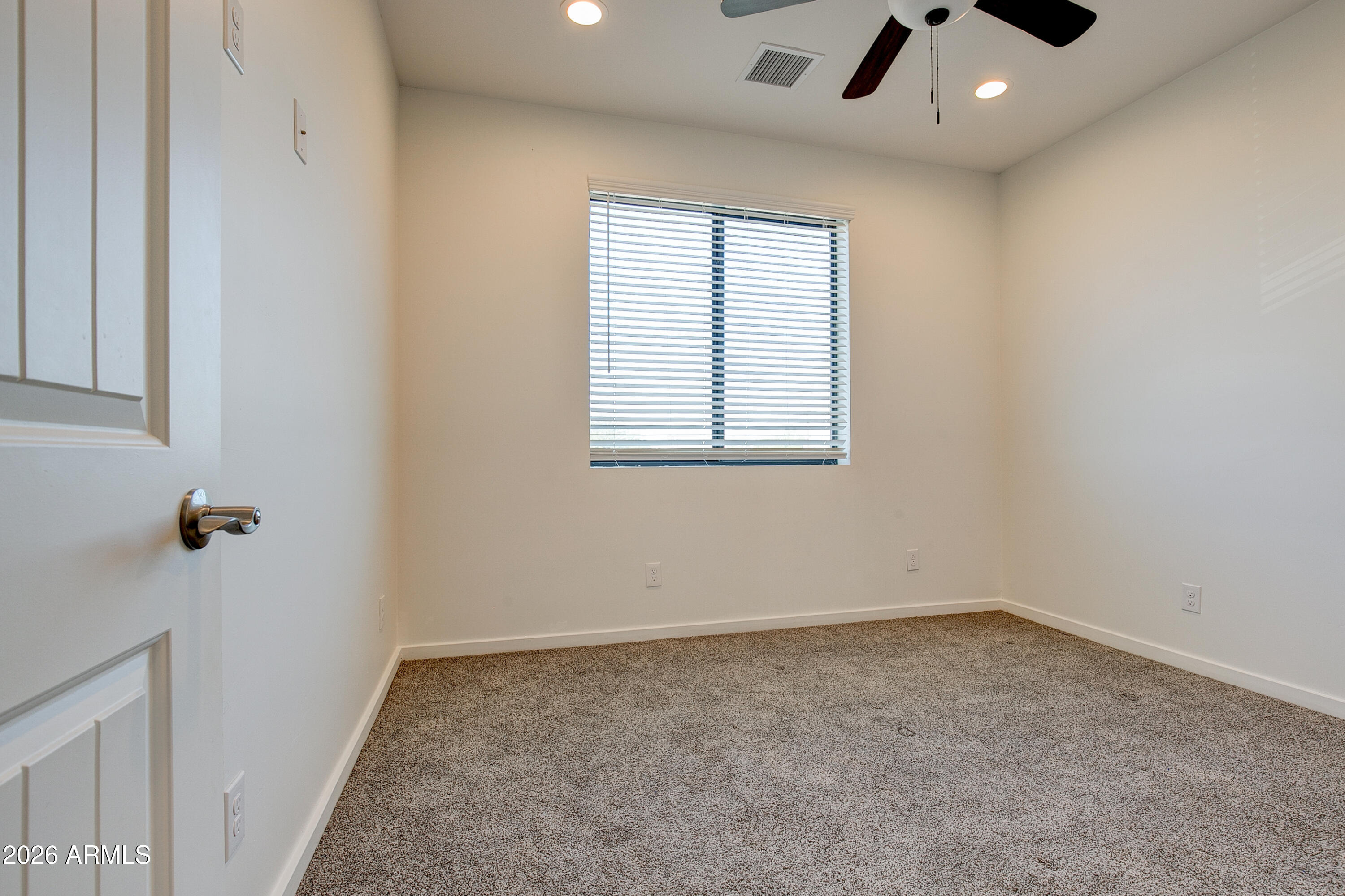 16075 North 30th Street Phoenix, AZ 85032 - Photo 30 of 41 an empty room with a window