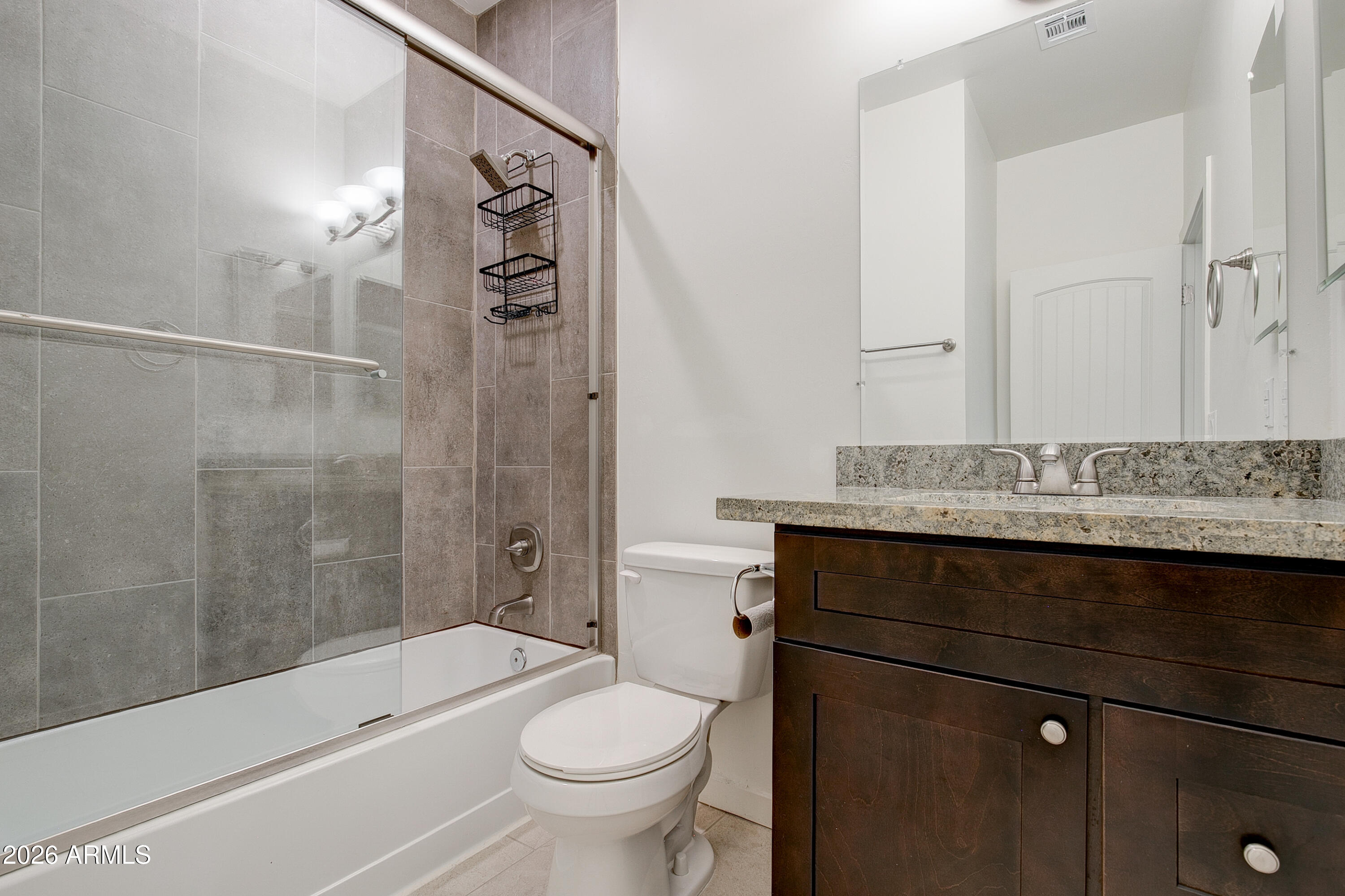 16075 North 30th Street Phoenix, AZ 85032 - Photo 34 of 41 a bathroom with a sink a toilet and shower